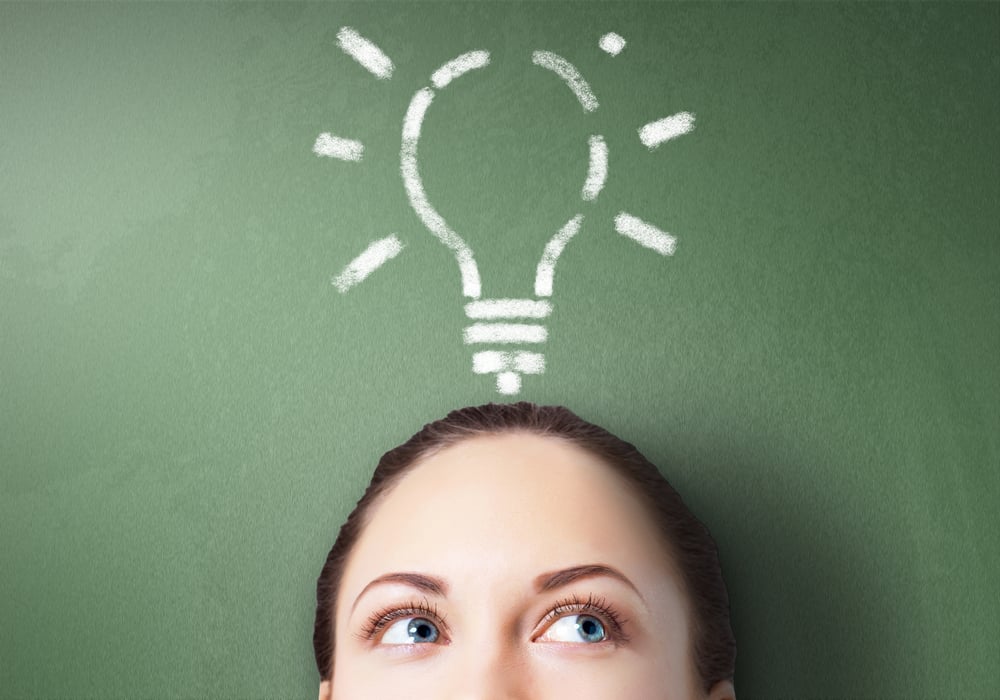 Young businessman with ideas as symbol of business creativity Young businessman with ideas as symbol of business creativity